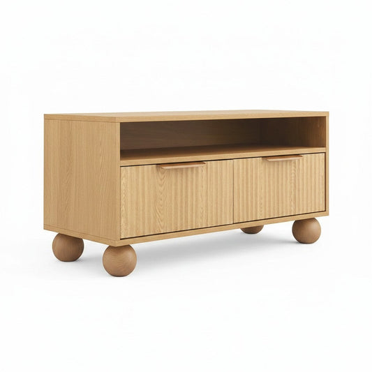 Direct Furniture Depot Oslo coffee table in light wood grain with an open shelf, two fluted drawers, and sphere legs.
