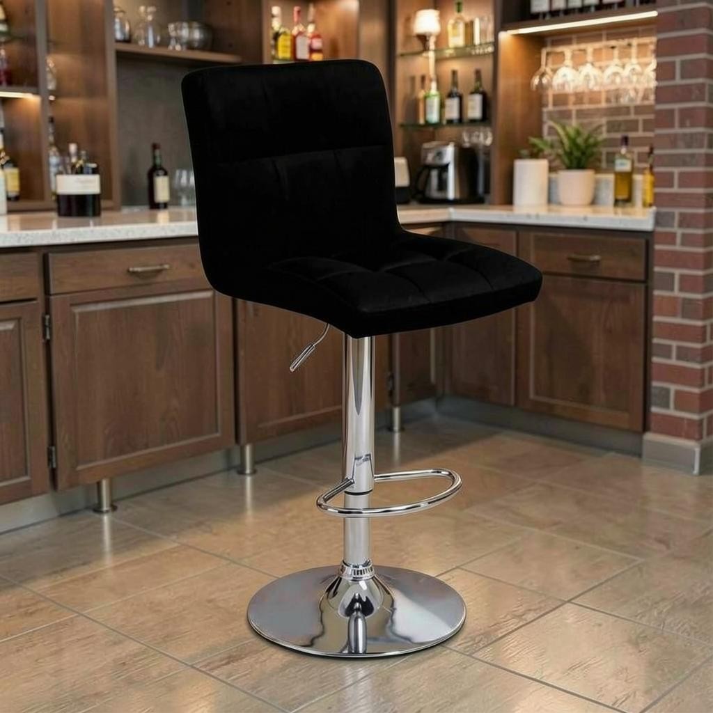 Direct Furniture Depot Elysian adjustable bar stool in black velvet with a tufted seat and chrome pedestal base.
