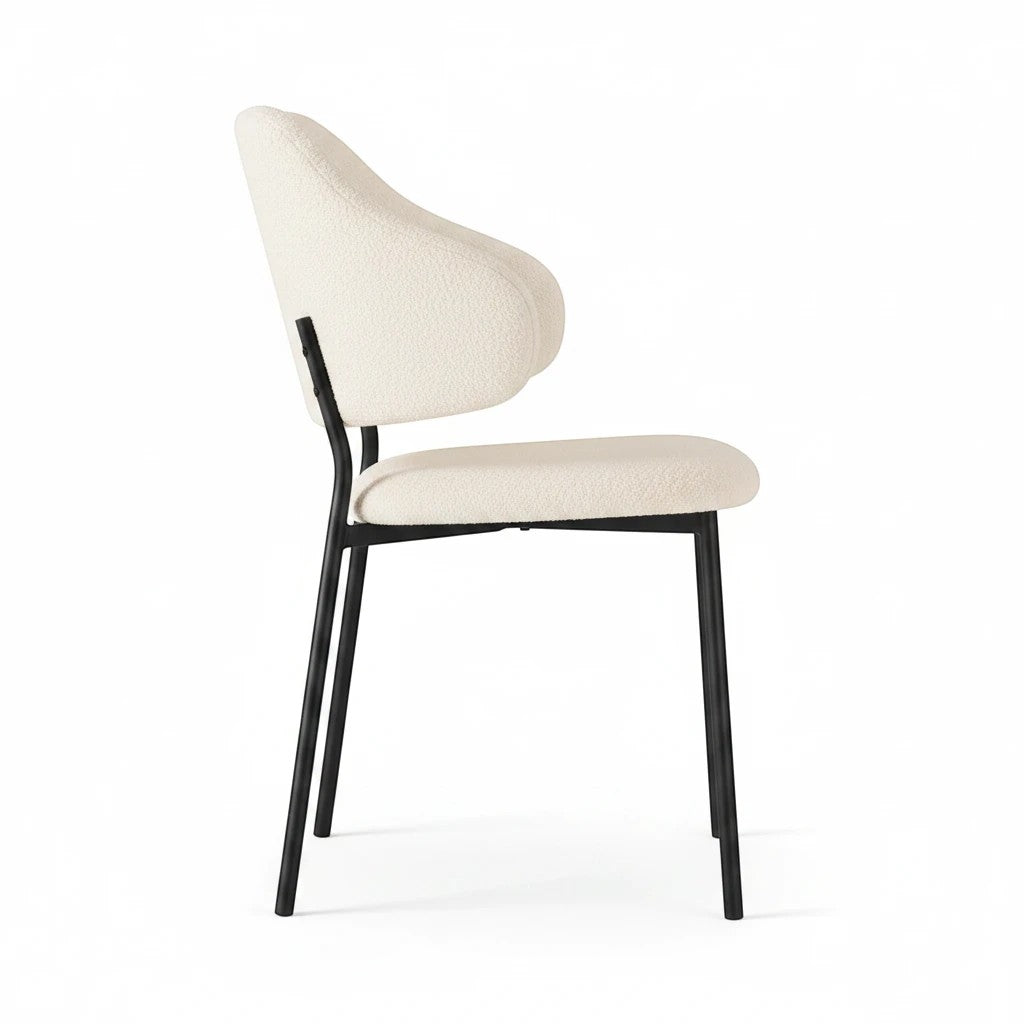 Direct Furniture Depot Aven Sherpa Chair in cream with a curved backrest and sleek black metal legs, side view.