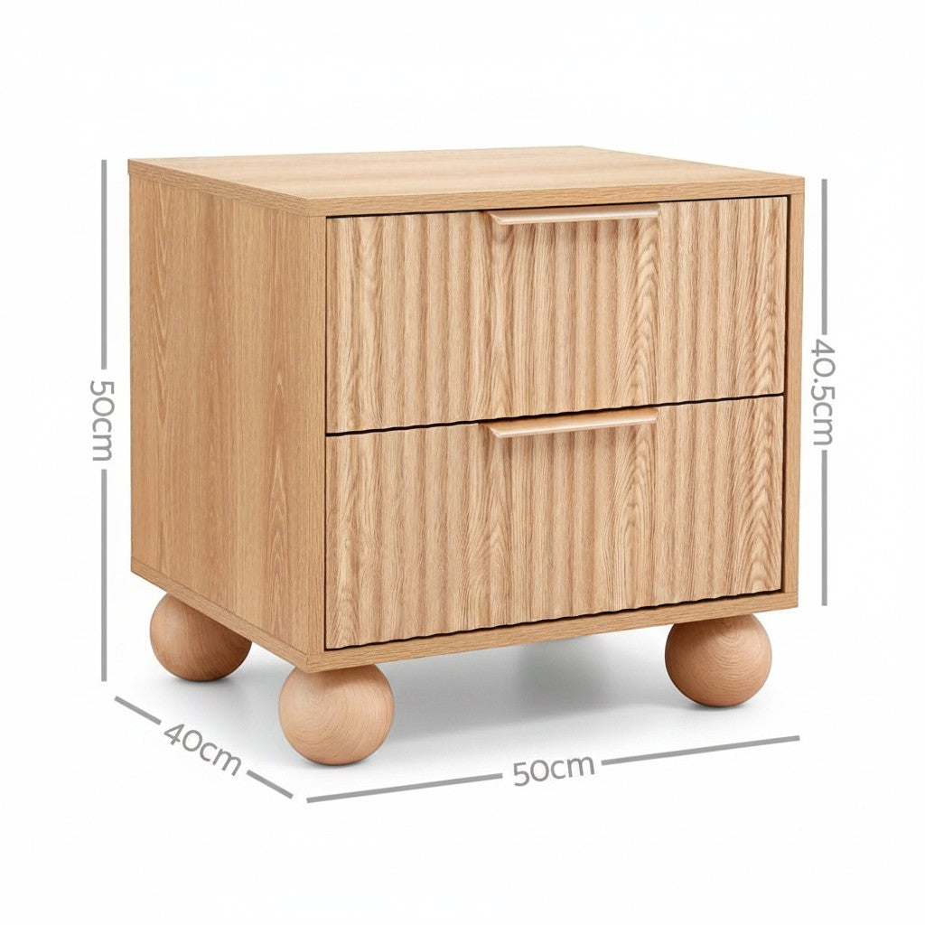 Direct Furniture Depot pine bedside table with two drawers, fluted front panels, and unique spherical wooden legs.